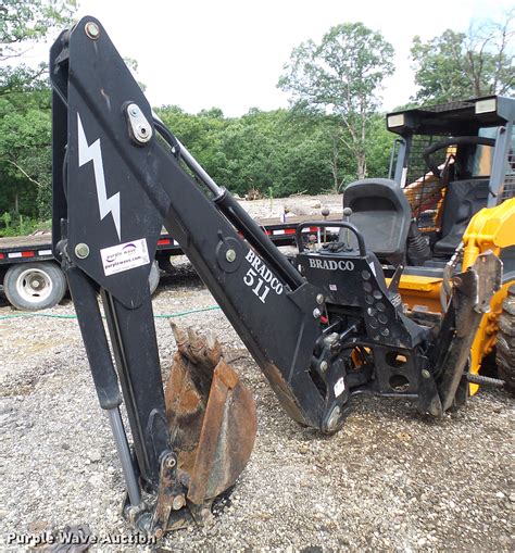 bradco skid steer backhoe attachment|bradco attachments website.